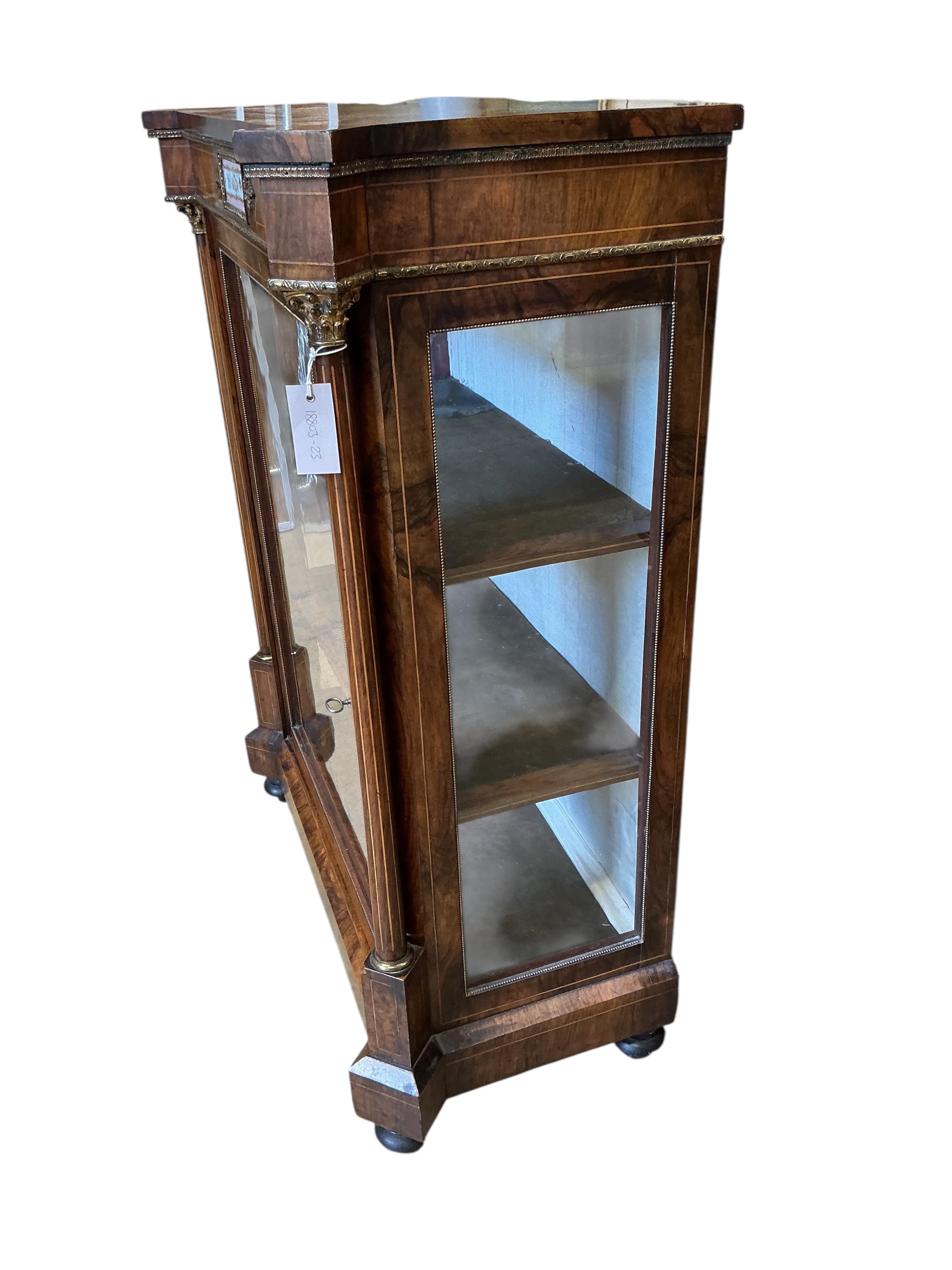 A Victorian walnut and porcelain mounted pier cabinet, width 82cm, depth 40cm, height 108cm
